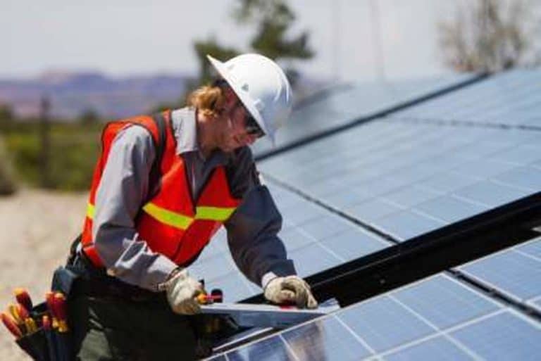 Residential Roofing Services Shoreview MN 1 Residential Roofing Services Shoreview MN - Roofer Installing Solar Roof Tiles