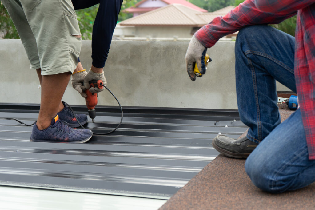 Elevate your property with expert metal roof repair in minneapolis: commercial metal roof repair pic